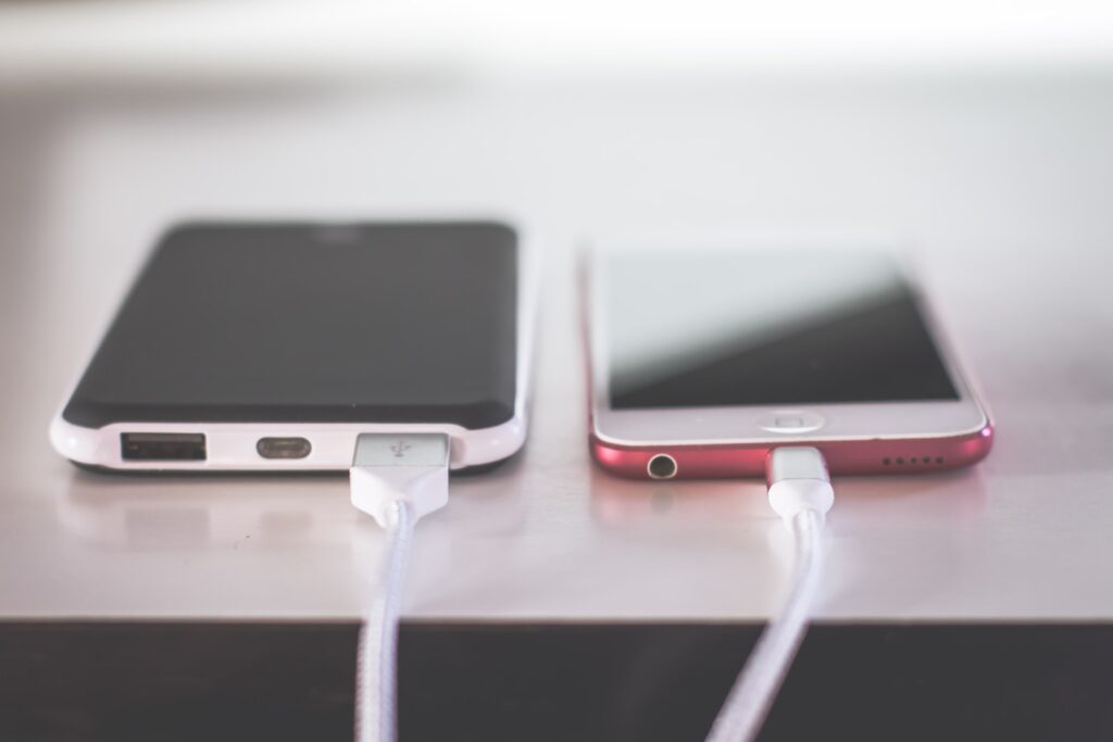 two phones on white table